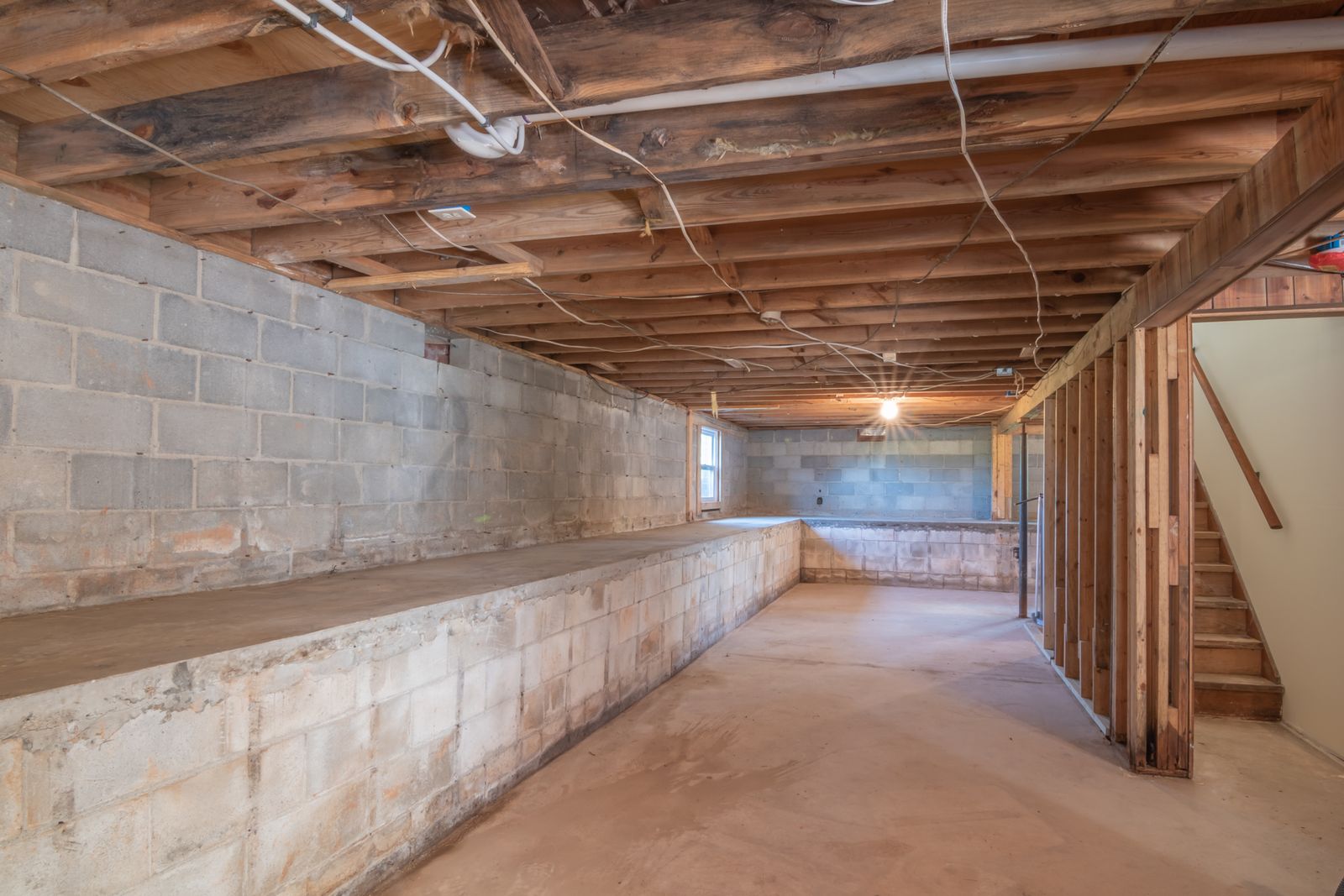 Unfinished basement with block foundation walls