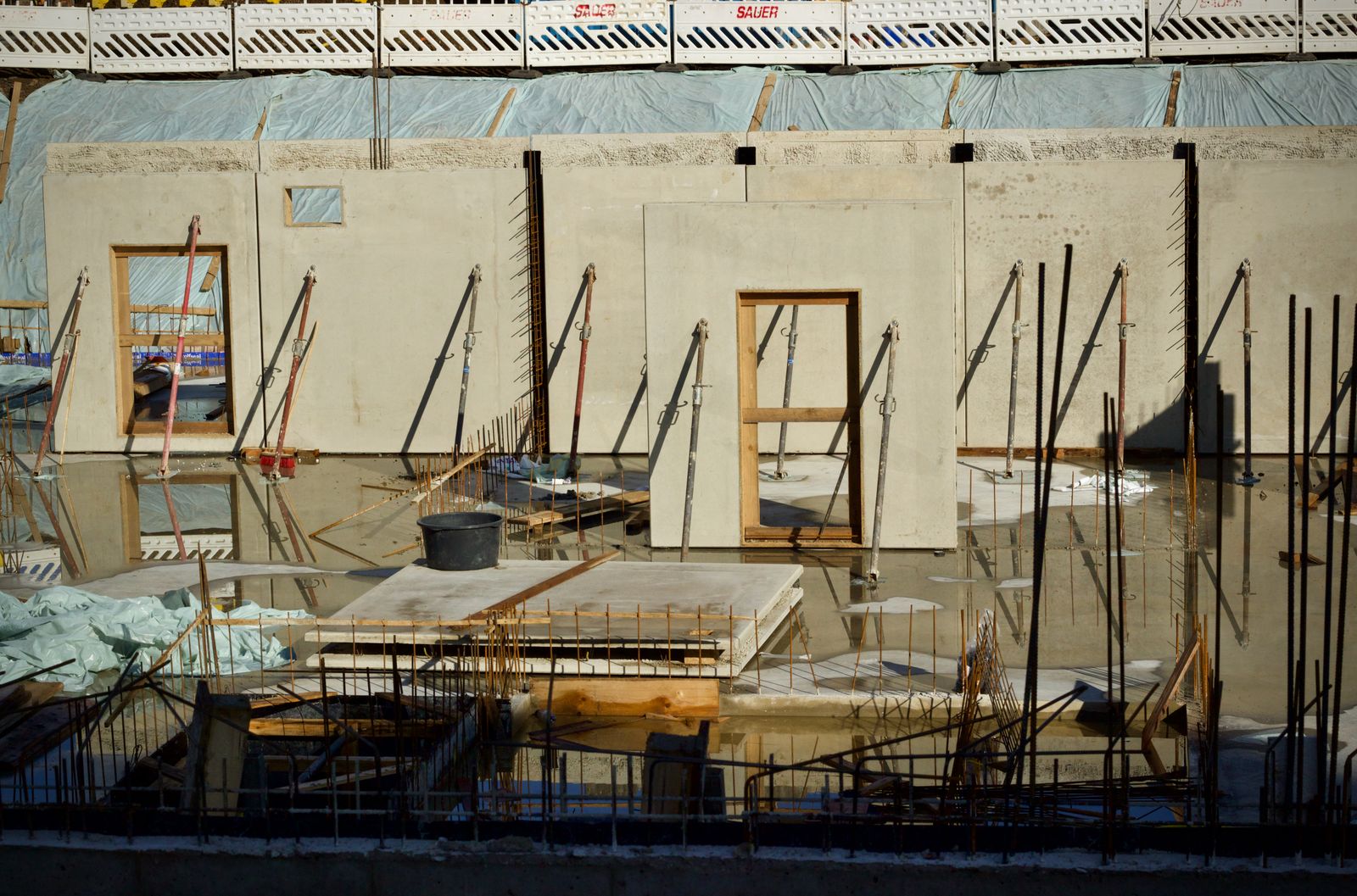 Concrete walls and formwork at a construction site