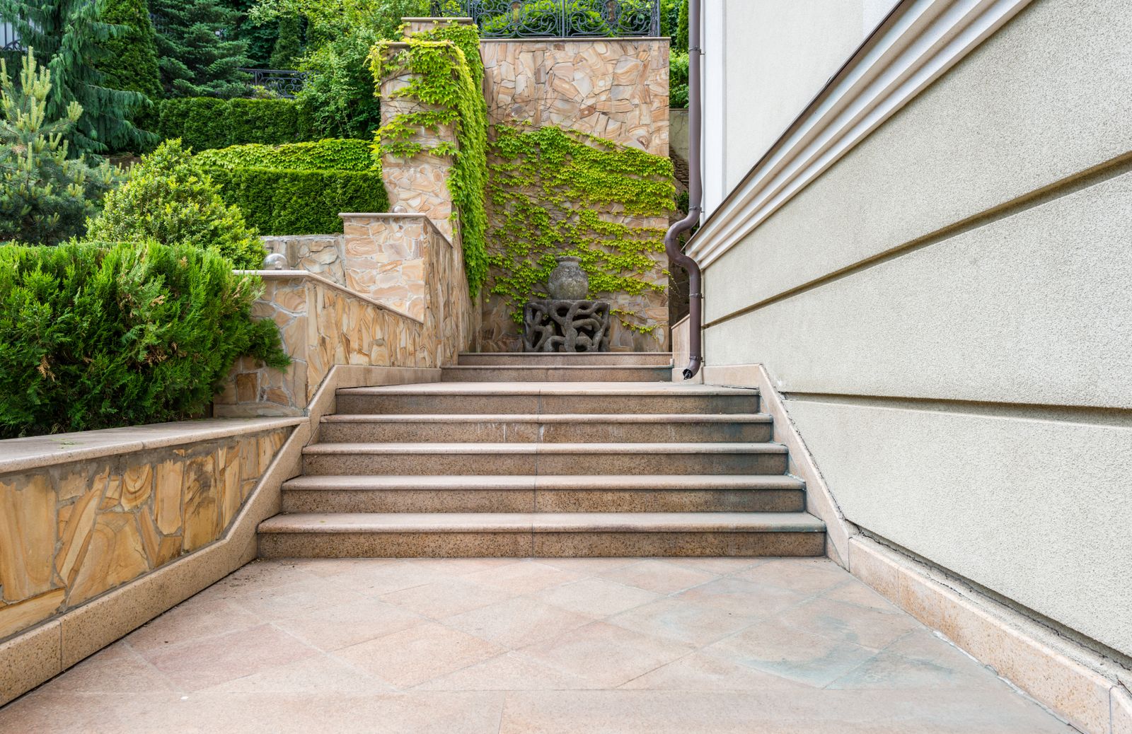 Stone front steps and landing at a home entrance
